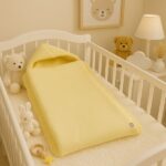 Saco envolvente para recién nacido con capucha