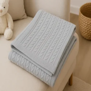 Manta trenzada para bebé gris